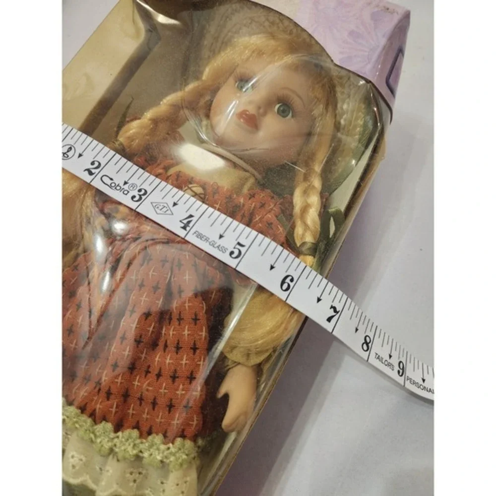 Collectable Porcelain Doll in Box Blonde Hair Blue Eyes Brown Dress FlowerBasket - Picture 6 of 7